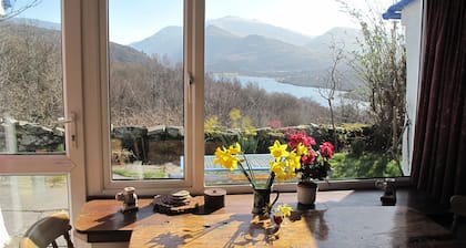 Traditional stone built cottage with fantastic view of lake and mountains