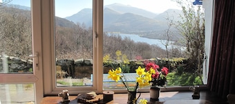 Traditional stone built cottage with fantastic view of lake and mountains