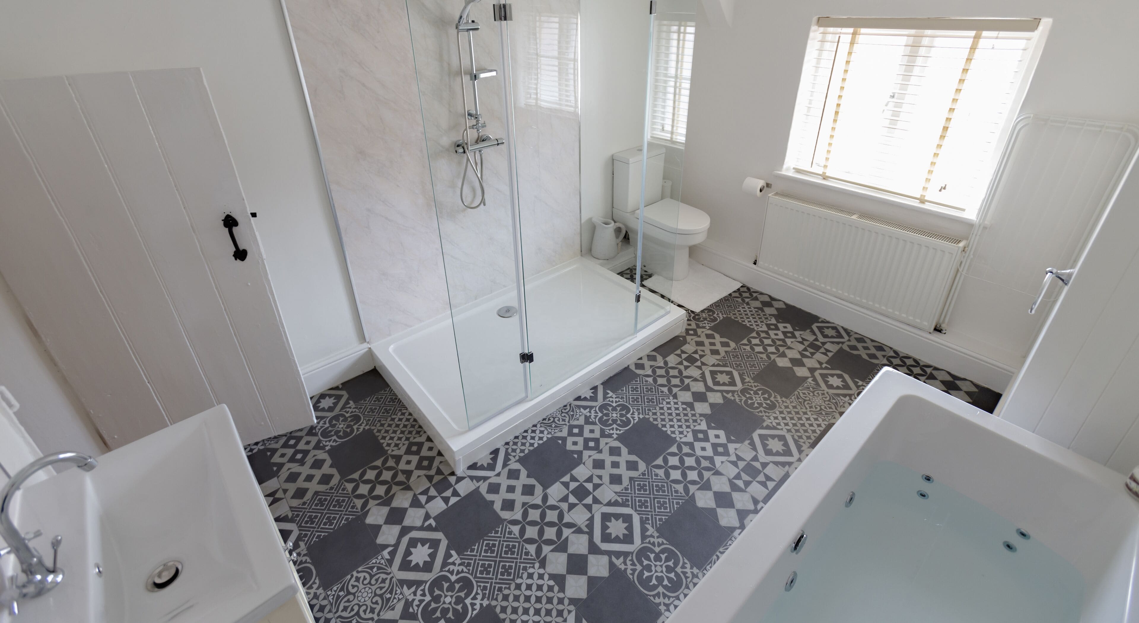 Bathtub, jetted bath, hair dryer, towels
