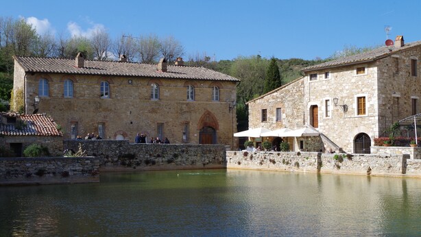 A stone building with a courtyard and a small pool. - House in Val d'Orcia perfect for relaxation CIN IT052024C2APXZK7PD  (RADICOFANI)