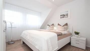 2 slaapkamers, een strijkplank/strijkijzer, reisbedje, gratis wifi