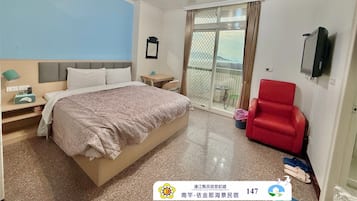 Desk, laptop workspace, blackout curtains, free WiFi