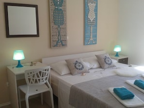 2 bedrooms, desk, iron/ironing board, travel cot