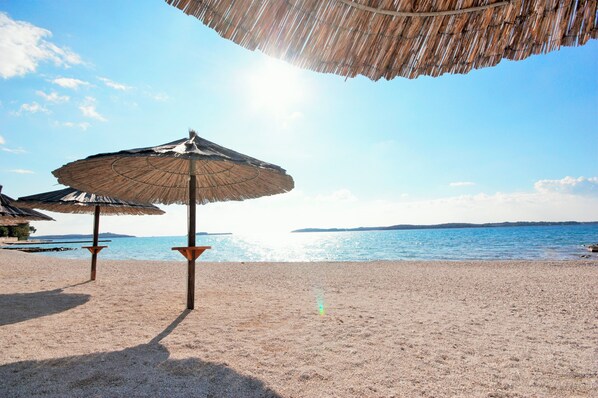 Beach nearby, sun-loungers