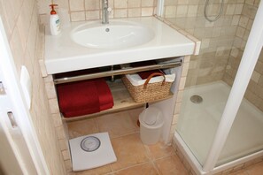 Hair dryer, towels, soap, shampoo