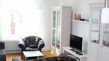 Smart TV, books, music library, stereo