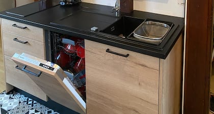 Appart T2 musée auto, garage, cuisine équipée, lumineux, calme.