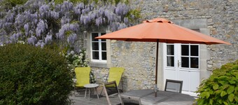 Stone cottage near Bayeux and D-Day sites, green and quiet.