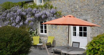 Stone cottage near Bayeux and D-Day sites, green and quiet.