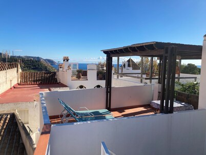 Village house with large rooftop terrace near the beach