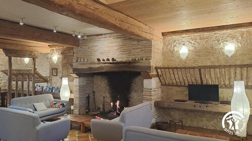 For Christmas, 10-person self-catering cottage with large fireplace, extra beds available.