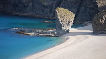 Una spiaggia nelle vicinanze, teli da spiaggia