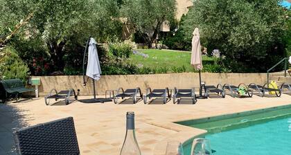 Self-catered villa with private pool in a flowery garden with trees