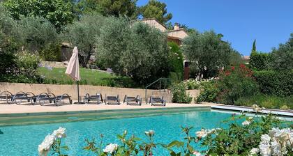 Self-catered villa with private pool in a flowery garden with trees