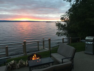Family Friendly Lake Front Property on the Water's Edge.  Spectacular Setting.