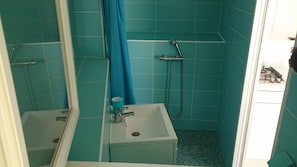 Shower, hair dryer, towels, toilet paper