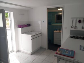 Shower, hair dryer, towels, toilet paper