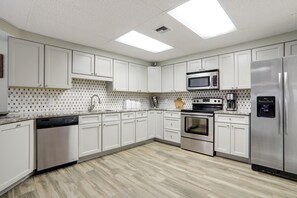 Well stocked kitchen with new appliances