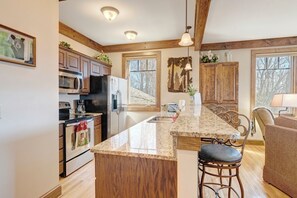 Dishwasher, coffee/tea maker, cookware/dishes/utensils, dining tables