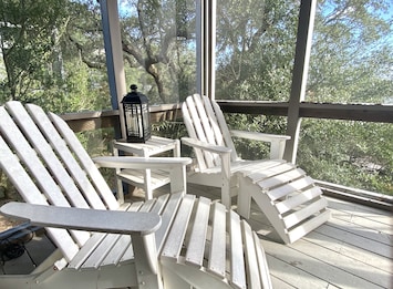 Screened in porch overlooking creek views