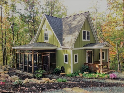 Contemporary rustic home nestled among boulders on 5 wooded acres