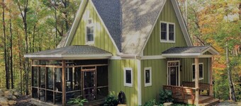 Contemporary rustic home nestled among boulders on 5 wooded acres