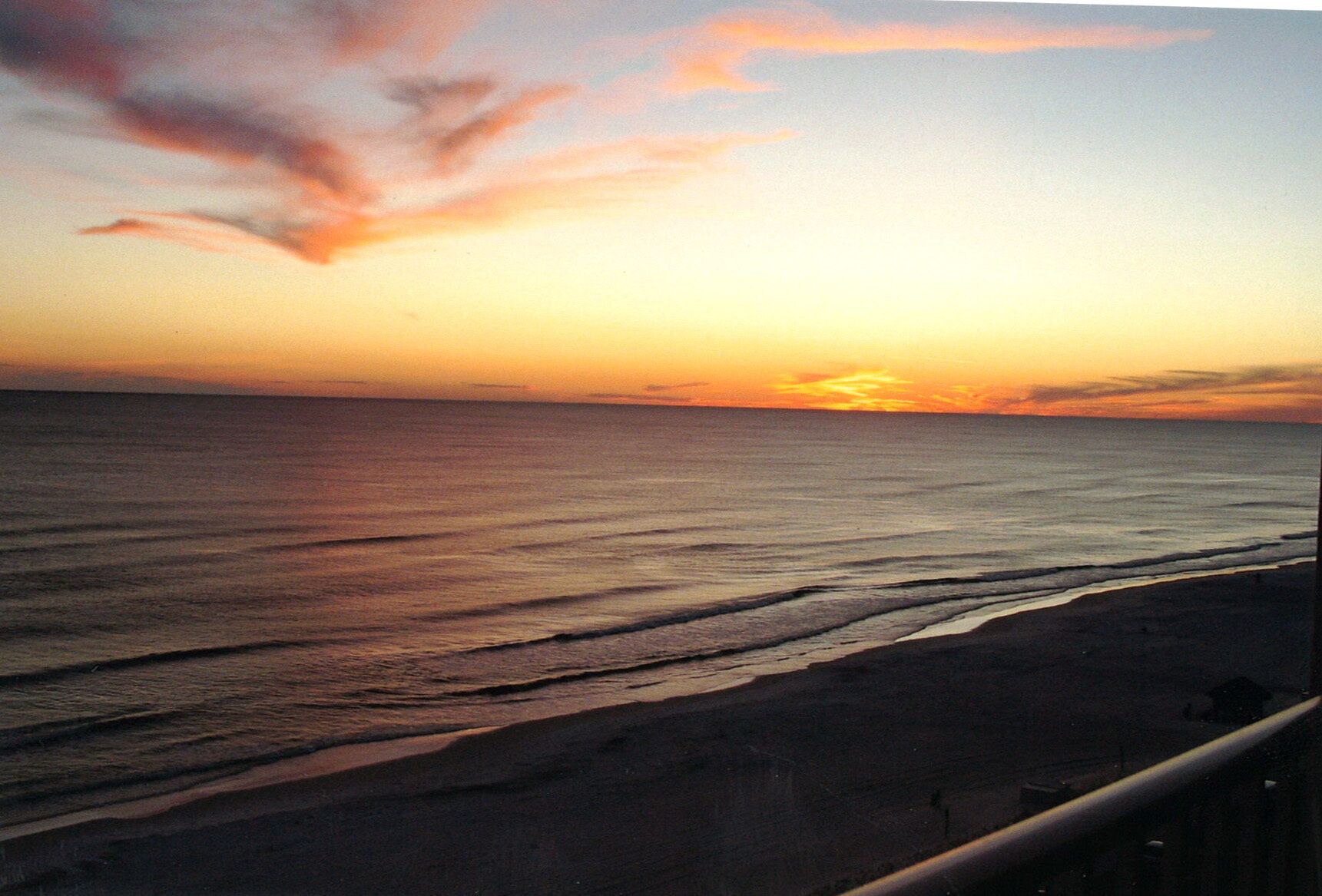 A beach with a sunset.