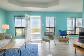 Open airy living room and kitchen 