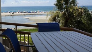 A balcony with a view of a beach and ocean. - 3BR/2BA Oceanfront- Gorgeous Southern View-Gorgeous Kitchen & Baths-Book Early! (Myrtle Beach)
