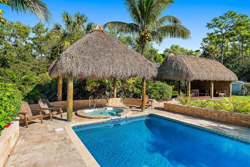 Tropical Oasis w/ Pool, Tiki & Spa! Private Jupiter Farms Retreat, Pet-Friendly!