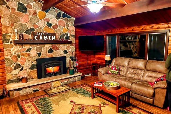Wood fireplace with swivel mount HDTV