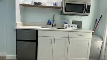 Fridge, microwave, coffee/tea maker, toaster