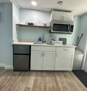 Fridge, microwave, coffee/tea maker, toaster