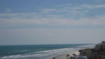 On the beach, sun loungers, beach towels