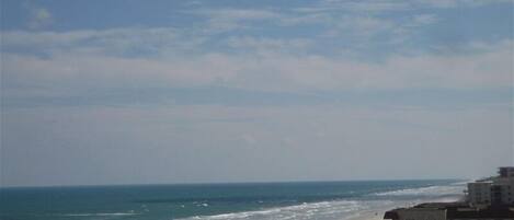 On the beach, sun-loungers, beach towels