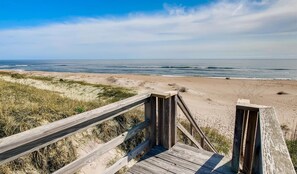 A wooden boardwalk leading to a beach with clear skies. - Semi-Oceanfront Home w/ Private Pool, Hot Tub, Game Room, Community Tennis (Waves)