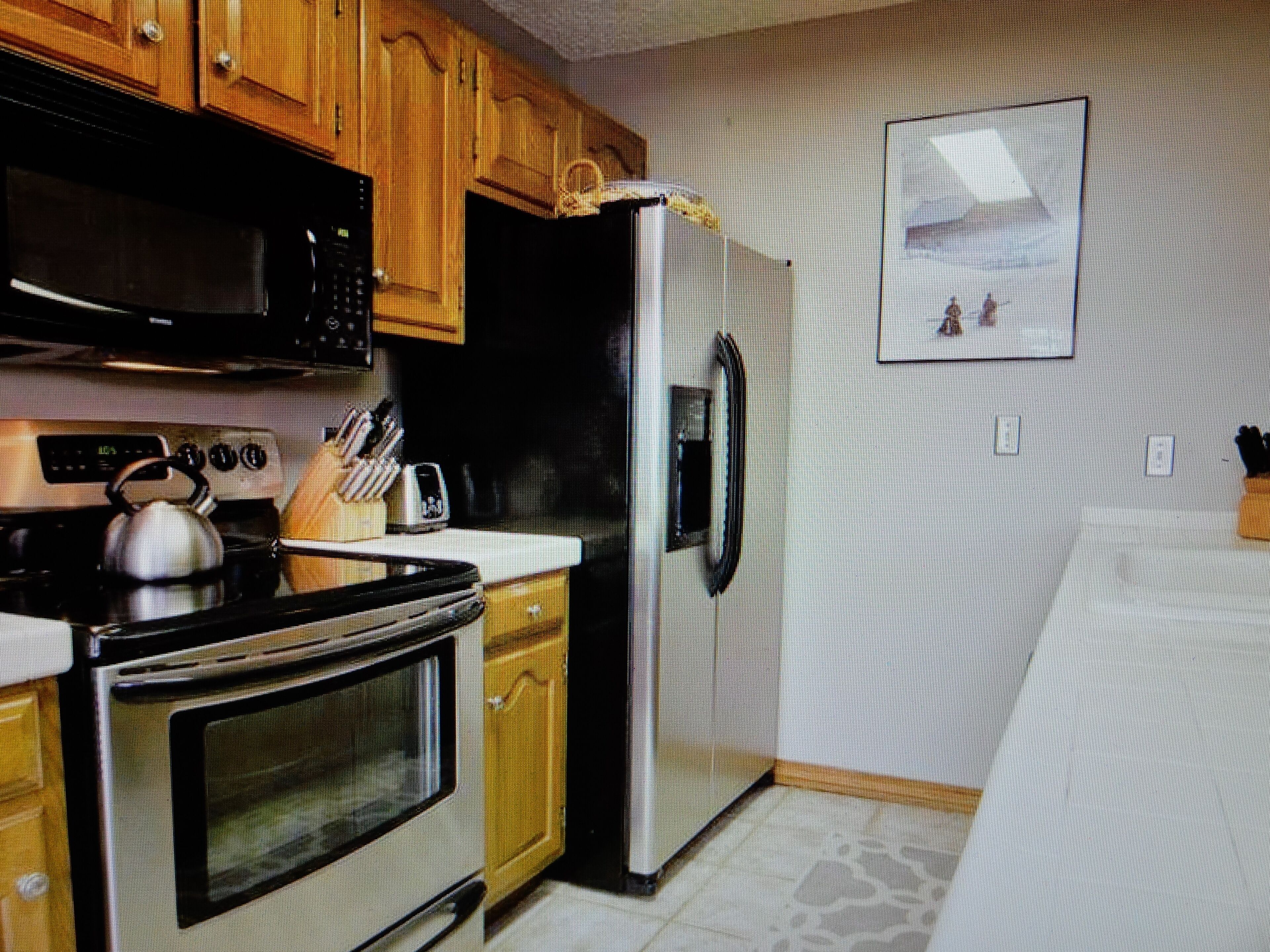 Location! Deck overlooks courtyard with newly renovated pool, hot tubs & grills!