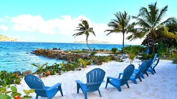 On the beach, sun loungers, beach towels
