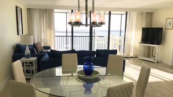 Flat-screen TV, DVD player, books