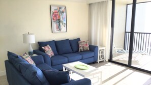 Flat-screen TV, DVD player, books
