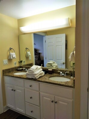Combined shower/bathtub, hair dryer, towels, soap - Gorgeous Gulf Views - 40 Ft Balc ; Free Beach Chair Set Up; Walk-In Showers! (Panama City)