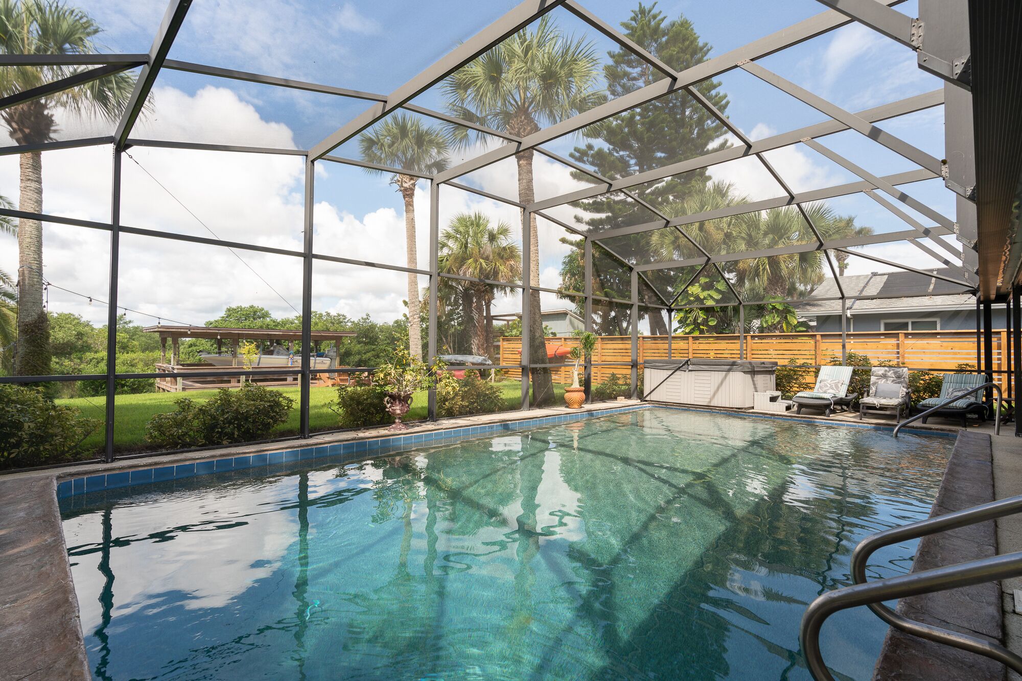 A Fisherman's Dream! Large Pool, Hot Tub, Canal front, Private Dock, a Must See!
