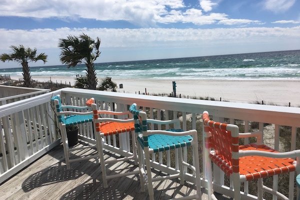 Early March 2018. New chairs w/ wide deck railing for dining.