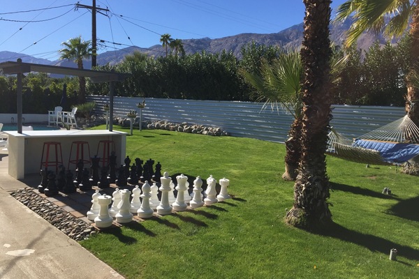 Giant chess set, large grassy yard, hammock and beautiful mountain views
