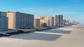 On the beach, sun-loungers, beach towels