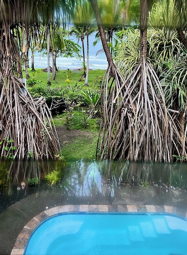 BEACHFRONT HAVEN OFFERS JOYFUL ONE OF A KIND HOLIDAY JUST STEPS FROM THE OCEAN