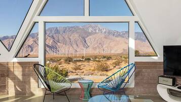 Smart TV, fireplace, books, offices