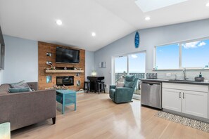 Smart TV, fireplace, DVD player, books