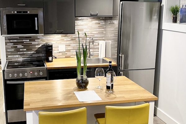 The island in the kitchenette is movable, making the living area flexible