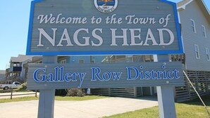 A welcome sign for the Town of Nags Head, Gallery Row District. - 4 Bedroom, 2.5 bath, sleeps 10, 1 block to beach with beach access and Hot Tub! (Nags Head)